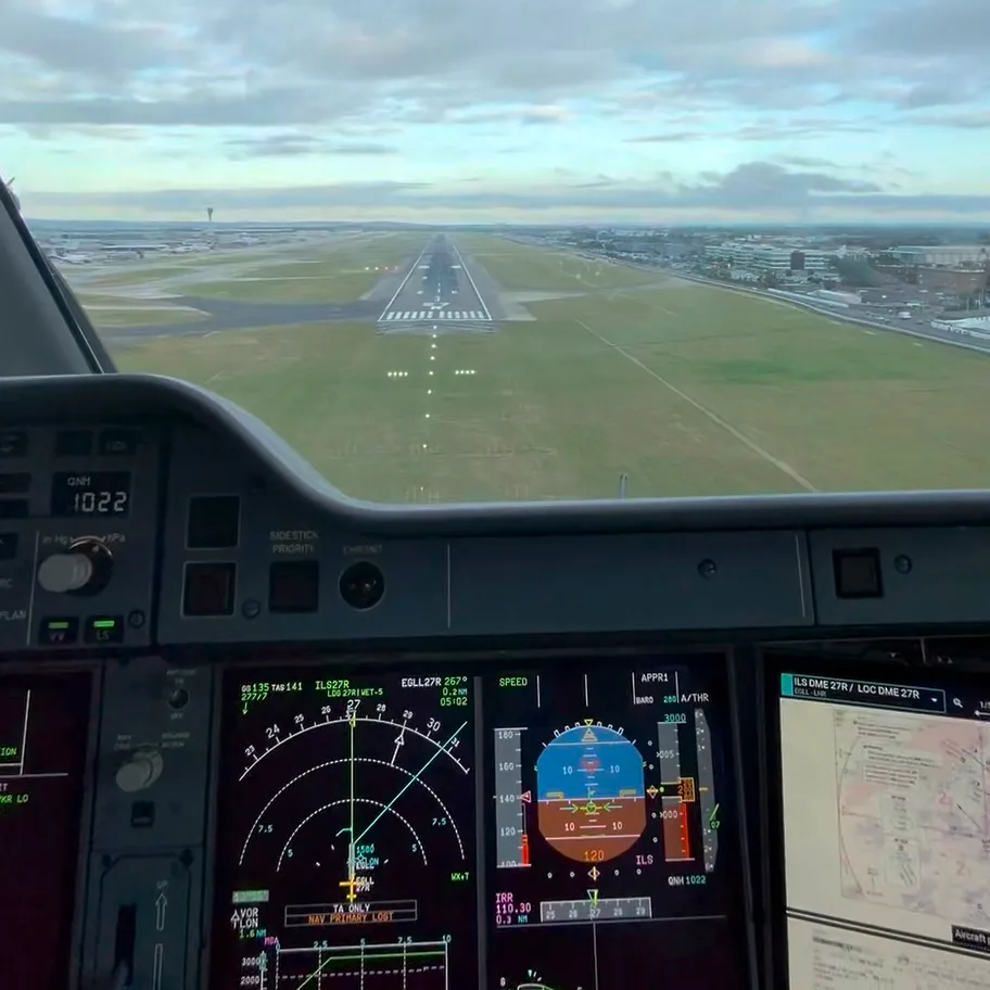 Cockpit view from 120ft, landing into LHR. ILS, VOR, 2x DMEs, VHF radio, weather radar, and the radalt are all in use. View from the cockpit on short final into Heathrow